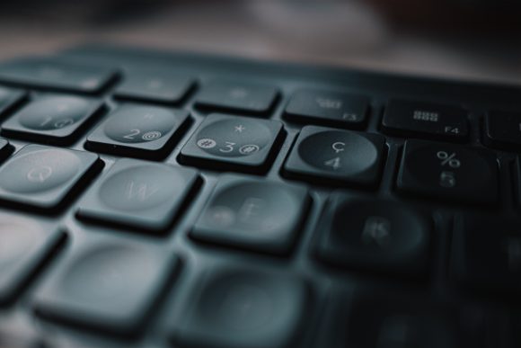 black computer keyboard in close up photography